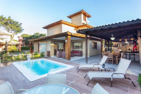 Omar do Rio - Casa Duplex Moderna com Área Gourmet e Piscina Privativa, 4 Suítes no Condomínio completo Laguna e Mare, em Manguinhos, Internet 400mbps, Smart TV e Garagem - CLM 20